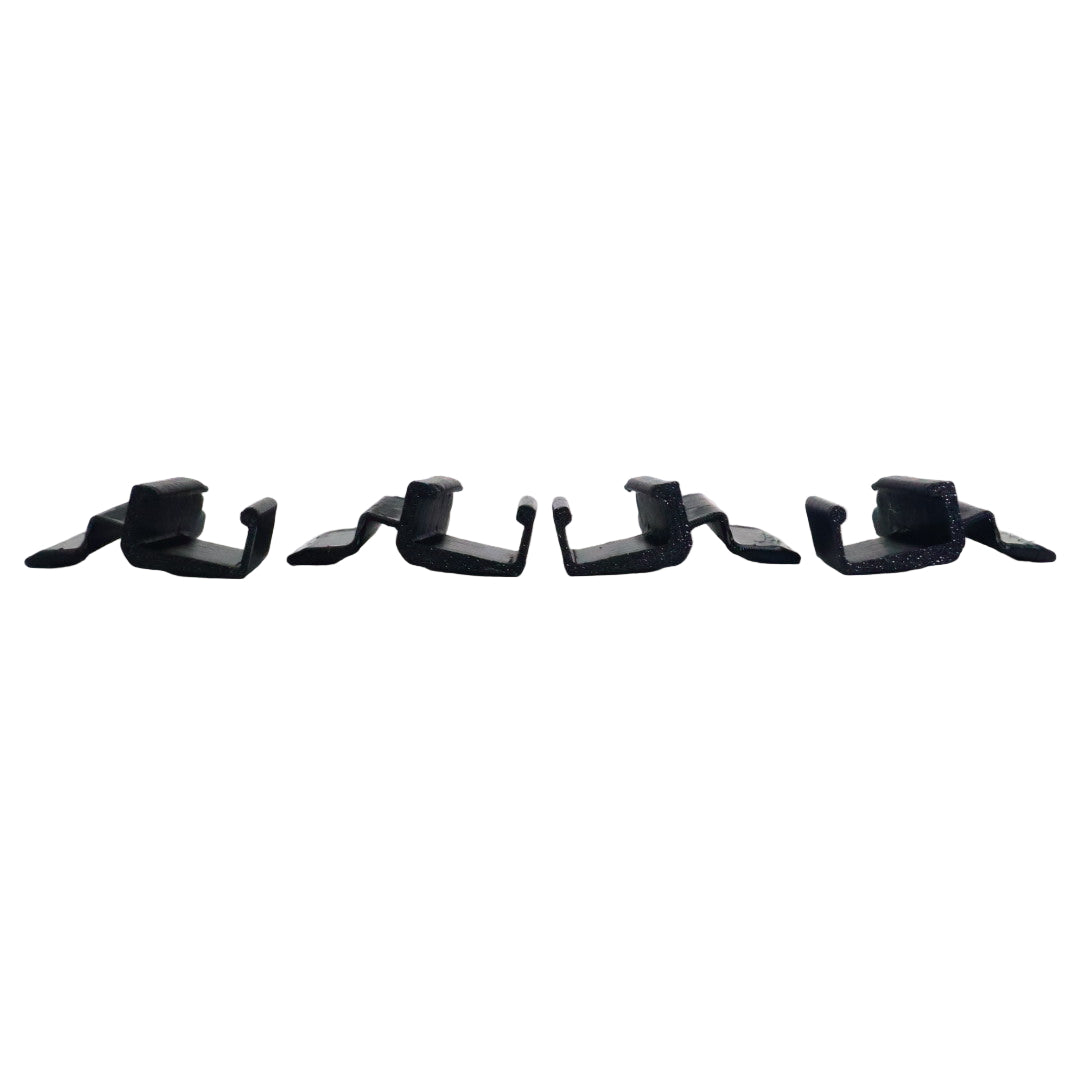 Five black plastic clips arranged in a row on a white background