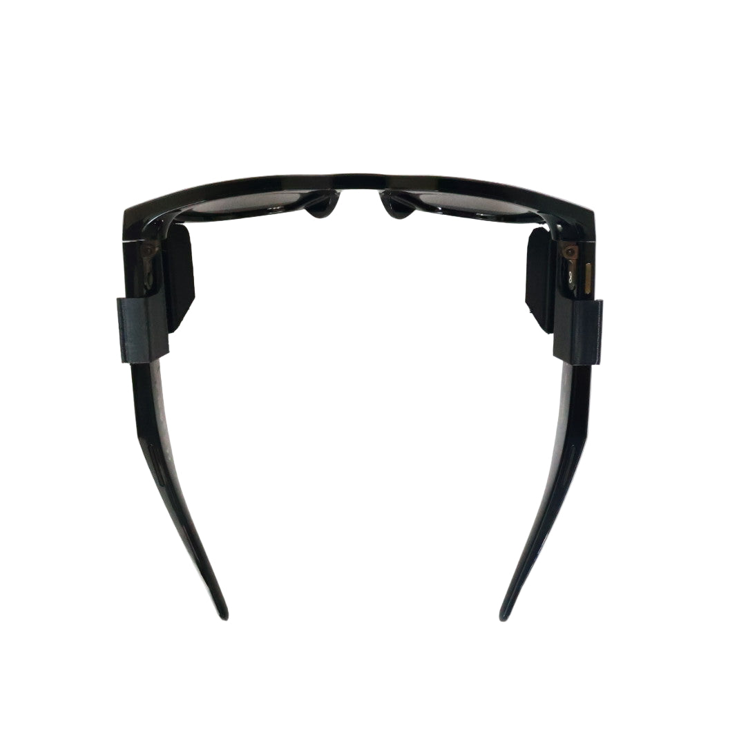 Black futuristic sunglasses on a white background
